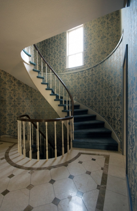 blue staircase abandoned mansion Ontario