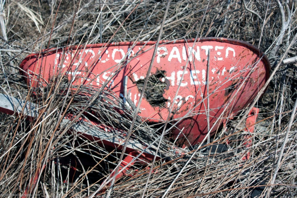 message painted on a wheelbarrow