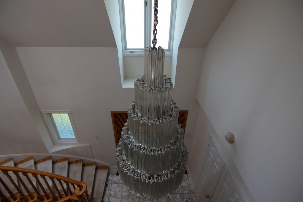 abandoned house tennis court chandelier