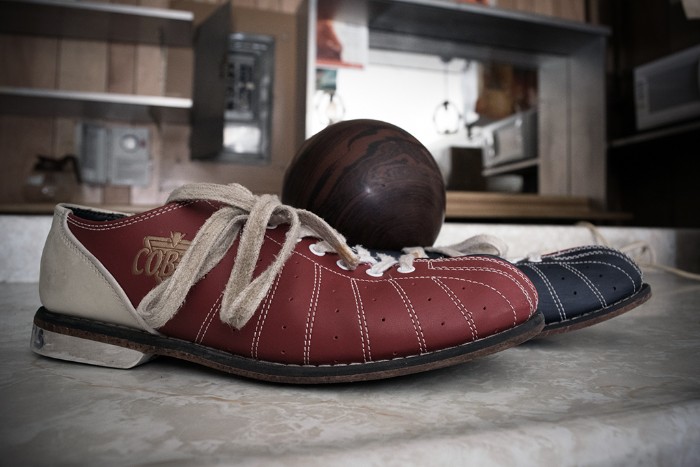 A pair of bowling shoes and bowling ball - Martin's Bowling Hamilton