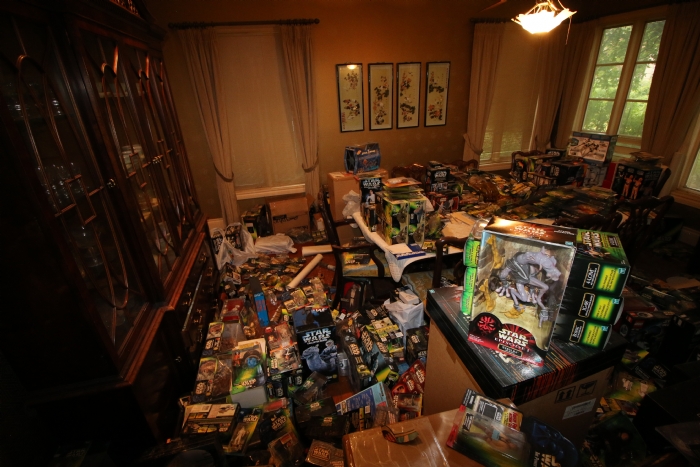 dining room filled with unopened Star Wars collectibles
